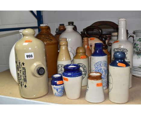 A GROUP OF STONEWARE FLAGONS AND STORAGE JARS, to include Philpott's foot warmer, selection of seven drinking bottles, M. Wis