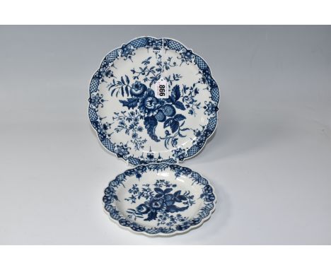 TWO WORCESTER FIRST PERIOD GRADUATING PLATES, mid to late eighteenth century, with a blue and white floral and foliate patter