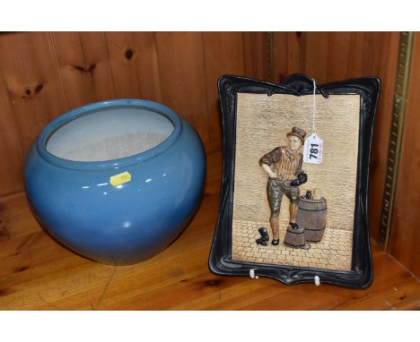 TWO BRETBY CERAMIC ITEMS to include a blue glazed jardiniere, height 20cm x width 27cm, and a Bretby 'Weller' plaque height 2