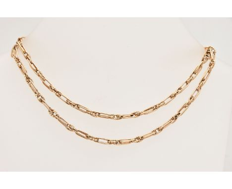A 9CT GOLD FANCY LINK CHAIN, fitted with a spring clasp, hallmarked 9ct Birmingham, length 600mm, approximate gross weight 21