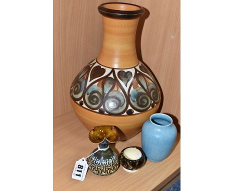 A GROUP OF FOUR CERAMIC VESSELS to include a Doulton Lambeth stoneware vessel, height 9cm, central band of relief floral patt