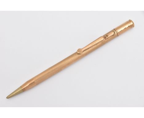 A 9CT GOLD PROPELLING PENCIL, engine turned pattern with vacant cartouche, hallmarked 9ct London, rubbed makers mark possibly