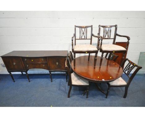 A REPRODUCTION MAHOGANY DINING SUITE, comprising a single pedestal extending dining table, with one additional leaf, diameter