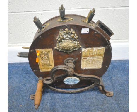 A KENTS OAK CASED KNIFE CLEANER, 199 High Holborn, London with a brass and a ceramic plaque, a special instructions label, fo