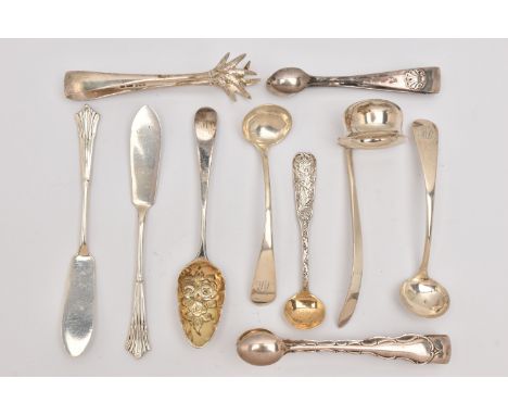 AN ASSORTMENT OF SILVER CUTLERY PIECES, to include three pairs of sugar tongs, a small ladle, two old English pattern sauce s