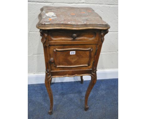 A 20TH CENTURY KINGWOOD POT CUPBOARD, with a wavy marble insert, a single drawer, over a single cupboard door, that’s enclosi