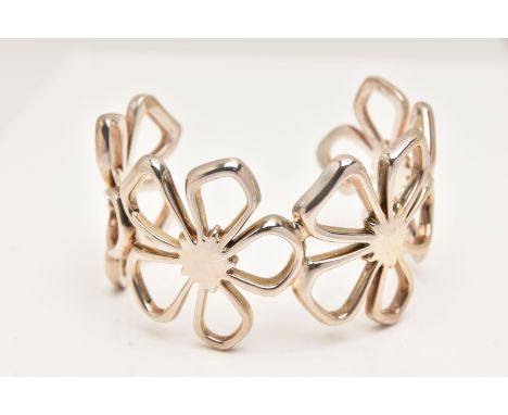 A HEAVY SILVER 'TIFFANY &amp; CO' FLORAL CUFF BANGLE, large open work flowers, approximate width 40mm, internal diameter 65mm
