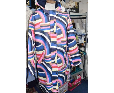 TWO LADIES BODEN COATS, comprising a multi-coloured rain coat with integral hood and a blue and white checked overcoat with l