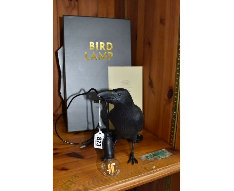 A BOXED SELETTI 'BIRD LAMP' DESIGNED BY SELETTI &amp; MARCANTONIO, a black 'Waiting' bird, height 18.5cm, with instructions a