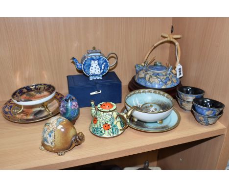 A QUANTITY OF ASIA-PACIFIC INTEREST ITEMS to include a sgraffito Malaysian Tenmoku Pottery flat teapot (diameter 16cm) with a