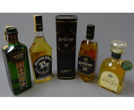 The Antiquary Superior Deluxe Scotch Whisky, 12 years old, in lozenge bottle and coaster top tube, W. Longmore Passport Scotc