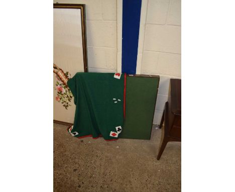 A folding card table and cover