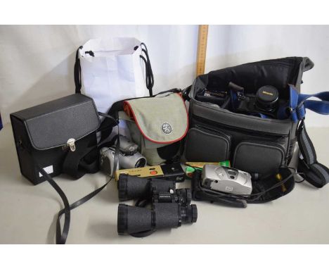 A Miranda camera together with travel case, lenses etc together with various other cameras