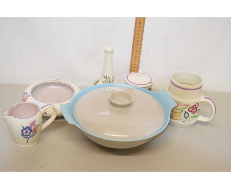A collection of Poole pottery wares to include serving dish, tankard, preserve pot etc