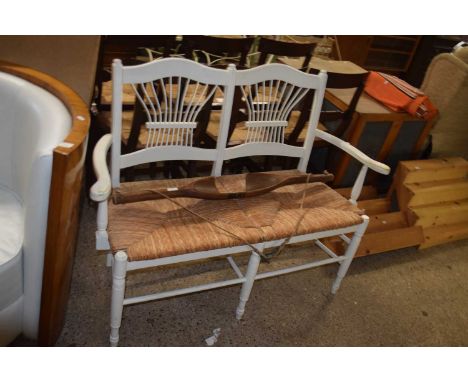 A rush seated two seater settle or sofa