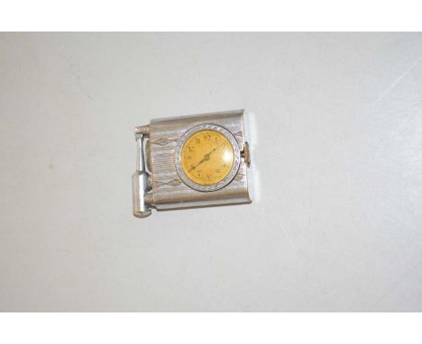 A novelty silver plated lighter with integral watch
