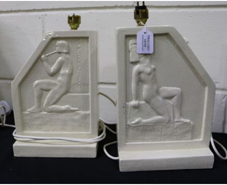 Pair of Egyptian revival ceramic lamps, each with moulded figures, stamped J. Mercier, with shades, approx. 34cm tall excludi