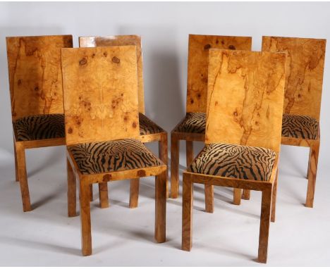 Set of six burr maple veneered dining chairs, in the Art Deco taste, each with rectangular back rests and tiger skin print up