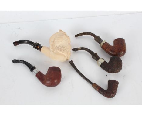 Collection of 19th/20th century pipes to include an exaple modeled as a bearded gentleman, another stamped Imported Briar Ome
