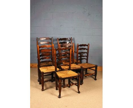 Matched set of six 19th Century ladder back dining chairs, to include two armchairs and four single chairs, (6)
