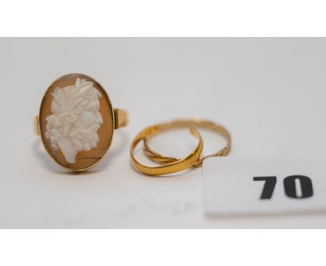 70. An 18ct yellow gold shell cameo RING (shell cracked), a broken 22ct gold RING & an an unmarked yellow metal RING, approx.