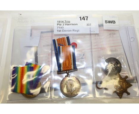 WW1 1914 & bar trio and silver war badge named 7193 Pte J.H.D. Harrison 1/Devon R and SWB number 9495, complete with basic re