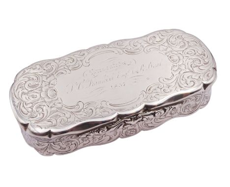 Victoria silver snuff box, of oblong form with shaped edges, engraved with personal inscription to the hinged cover, and foli