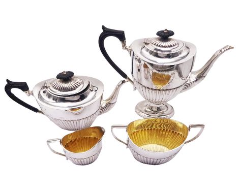 Late Victorian silver four piece tea service, comprising teapot, coffee pot with presentation engraving to body, twin handled