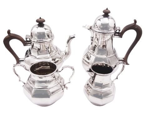 Four piece 20th century silver tea service, comprising teapot, hot water pot, twin handled sucrier, and cream jug, each of oc