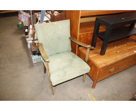 A button back upholstered armchair