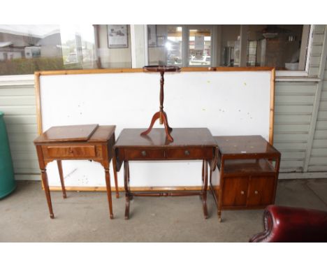 A reproduction sofa table together with a side cupboard and a sewing table lacking machine 