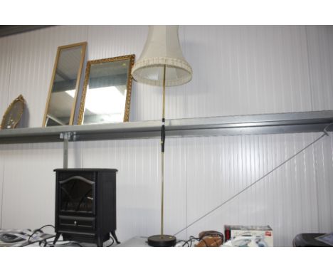 A standard lamp and shade