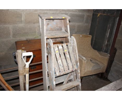 Two wooden step ladders