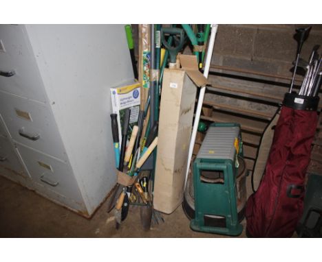A quantity of long handled gardening tools, step stool etc 