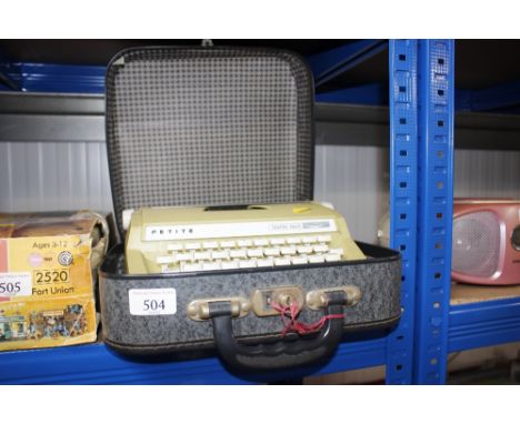 A typewriter in fitted case