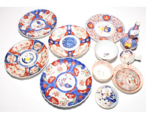 Five Imari porcelain dishes with scalloped edges and a similar double gourd vase