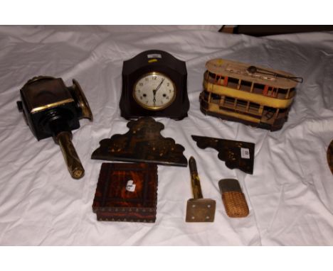 A table lighter made from a bullet, a tin plate tram, a folding oriental wall shelf, a leather covered box, a hip flask, a 19