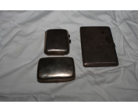 A gentleman's engine turned silver cigarette case and two ladies' silver cigarette cases