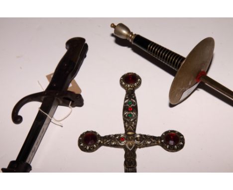 A 19th Century French bayonet with T-section blade in metal scabbard, a fencing foil and an ornamental dagger