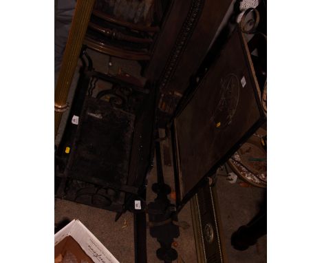 A wrought iron rectangular fire basket, a similar fender, a brass standard lamp on tripod base and a wrought iron and brass f