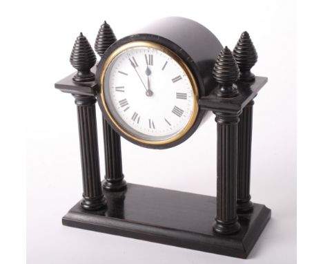 A 19th Century ebonised wood entablature mantel clock, 8" high