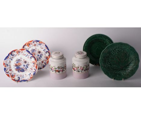 A pair of 19th Century continental porcelain floral decorated jars and covers, two Imari decorated plates and two leaf plates