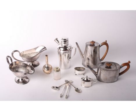 A plated oval teapot, a plated oval coffee pot, a pair of plated sauce boats, a plated cocktail shaker and other plated items