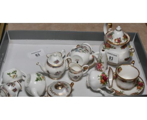 A miniature Royal Albert "Old Country Roses" teapot, cup and saucer, other miniature teawares and a collection of decorative 