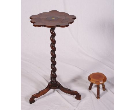 A 19th Century occasional table with lobed inlaid top, on spiral turned stem and tripod base, and a three-legged stool