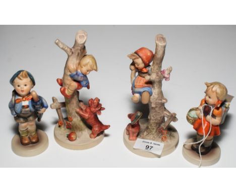 Two Hummel figures of children climbing trees and two others
