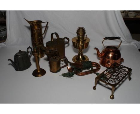 A brass water can, a brass pedestal oil lamp, a copper bugle, a copper electric kettle and other items of metal ware