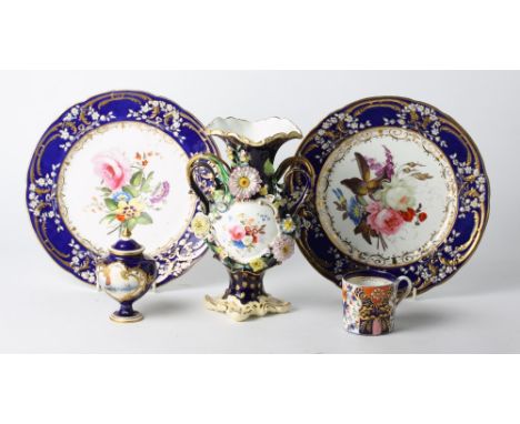 A pair of 19th Century blue and gilt decorated cabinet plates with hand-painted floral centres, a similar miniature Crown Der