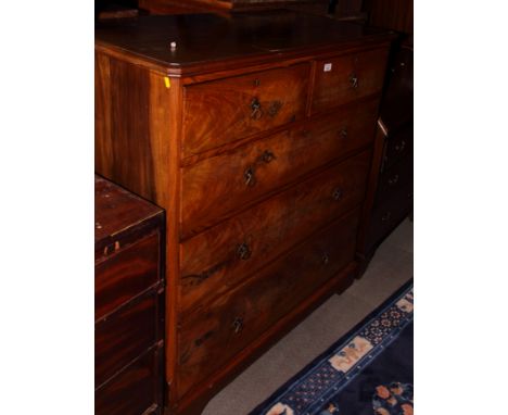 A late 19th Century figured walnut chest of two short and three long drawers, on bracket supports