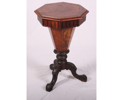 A Victorian figured walnut octagonal work table, hinged top inlaid chessboard, on tripod base, 18" dia